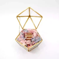 Flynn Glass Ring Box opening with wedding rings