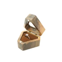 zephyr ring box open side view in brown cushion